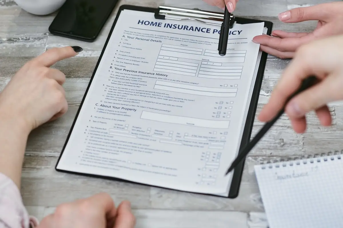 Insurance claim paperwork and documentation after a fire loss