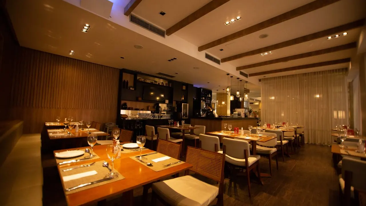 Empty restaurant dining room before service — reopening after a fire depends on sign-offs, not on how clean the room looks